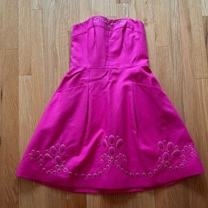 Lilly Pulitzer pink with gold detail strapless dress.